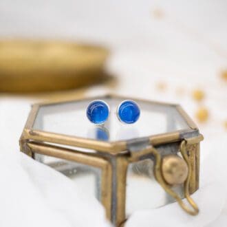 blue gemstone stud earrings set in silver