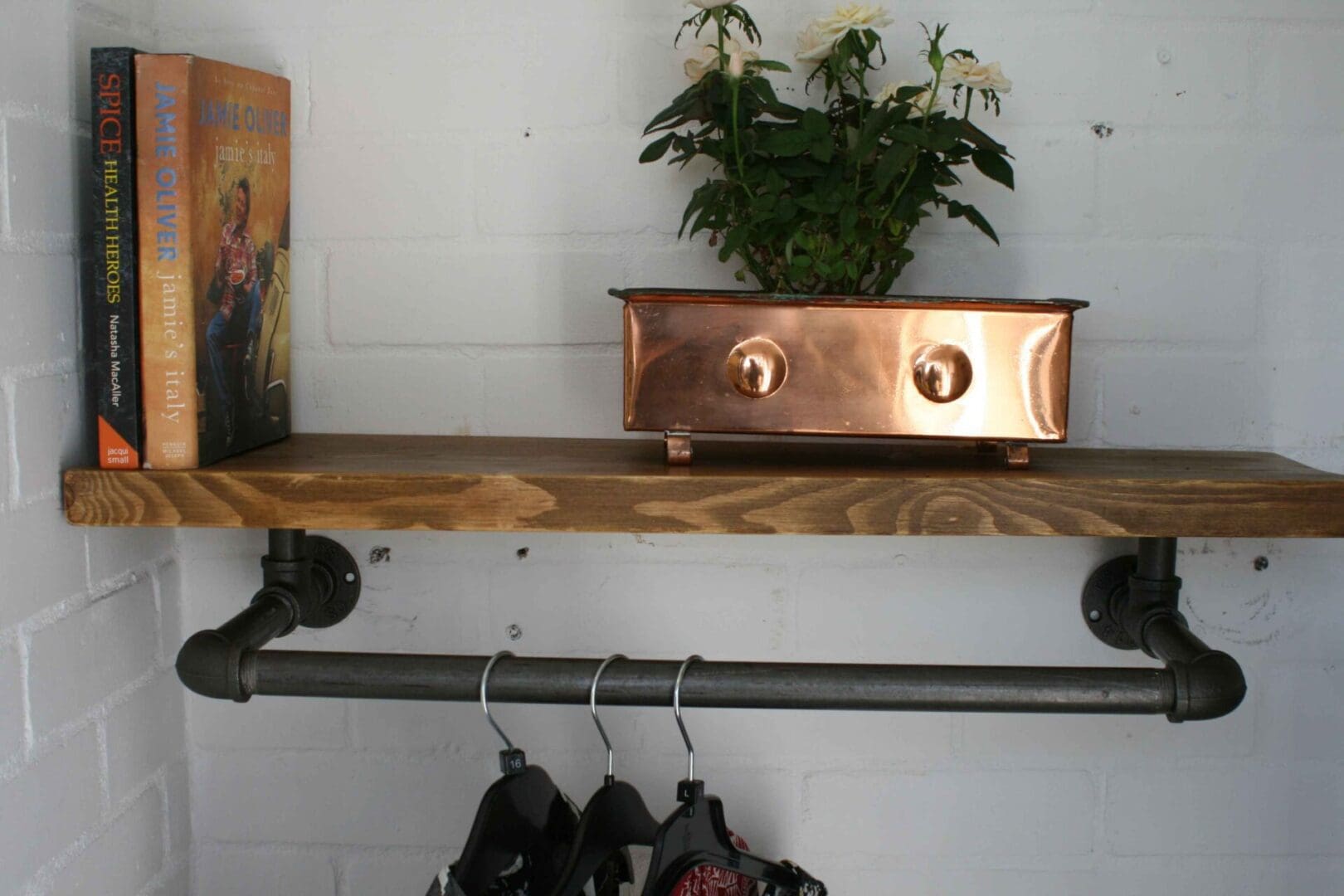 industrial clothes rail and rustic waxed shelf and bookshelf tbch