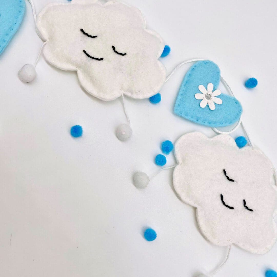 white clouds and blue hearts bunting