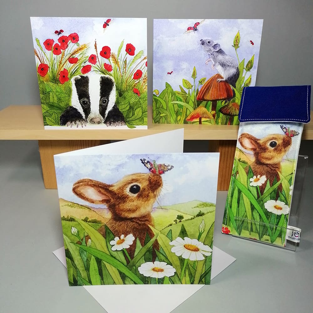 Set of three high quality, square greeting cards featuring British Wildlife, a badger cub, young rabbit and a grey mousie set in the countryside