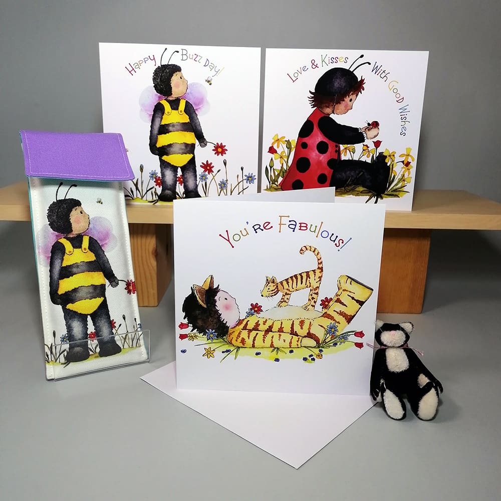 Set of three high quality, square greeting cards featuring the Bath Street Babies - toddlers dress in their favourite colourful costumes: a bee, ladybug and a cat with their little creature friends.