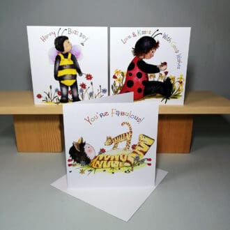 Set of three high quality, square greeting cards featuring the Bath Street Babies - toddlers dress in their favourite colourful costumes: a bee, ladybug and a cat with their little creature friends.