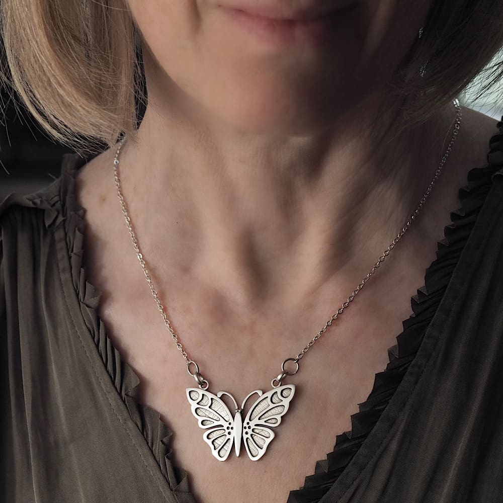 Statement Argentium silver butterfly necklace in vintage style with oxidised leaf texture detail