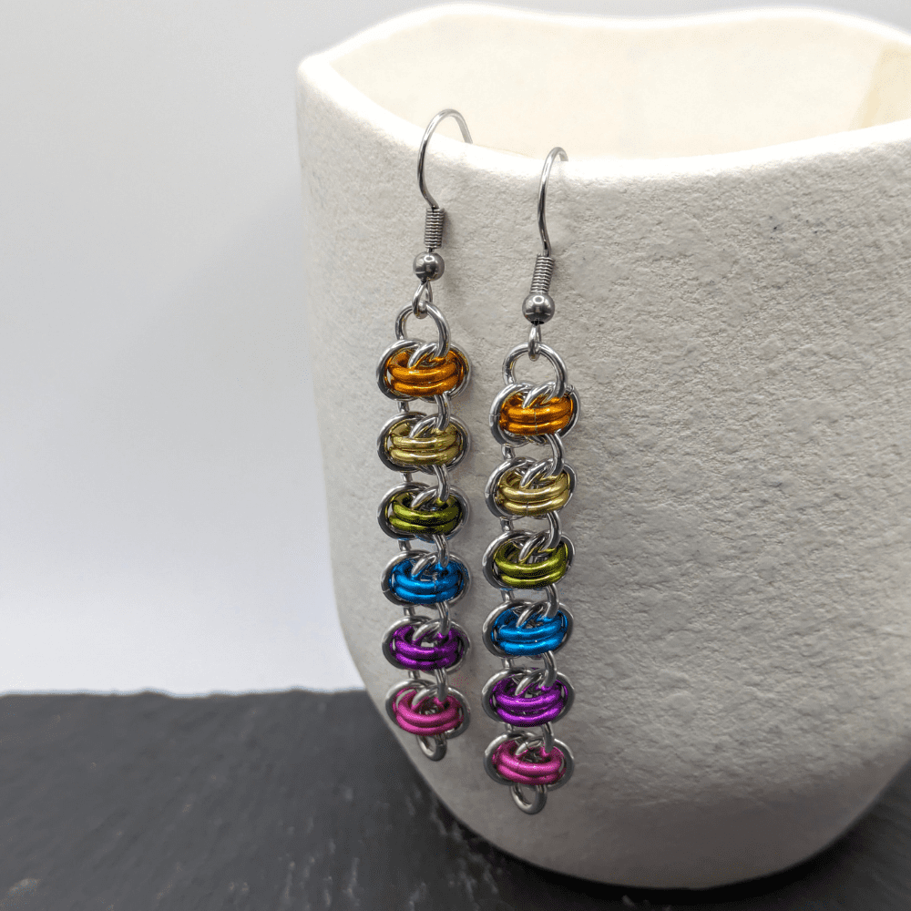 Barrel weave chainmaille earrings made with silver and bright rainbow coloured rings