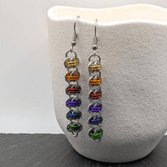 barrel weave chainmaille earrings made with silver and rainbow coloured rings