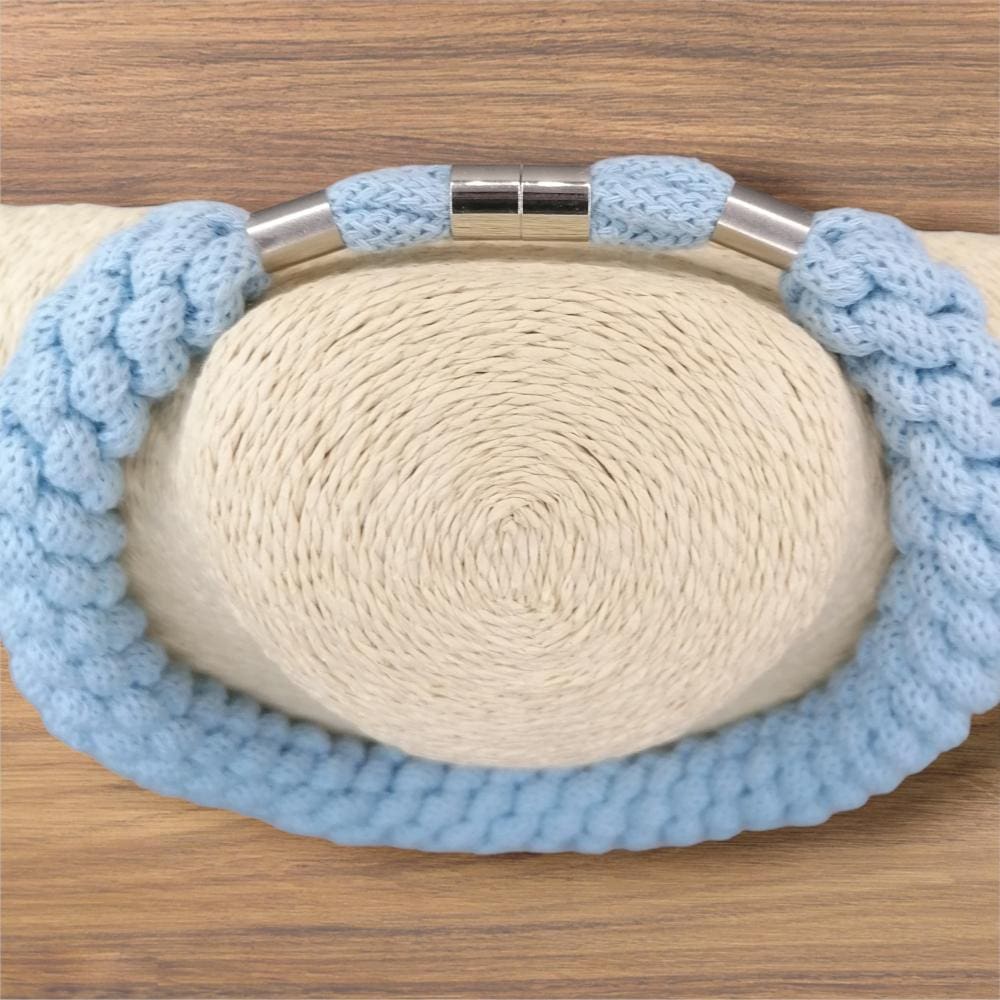 Overhead view of magnetic clasp detail on baby blue chunky rope necklace