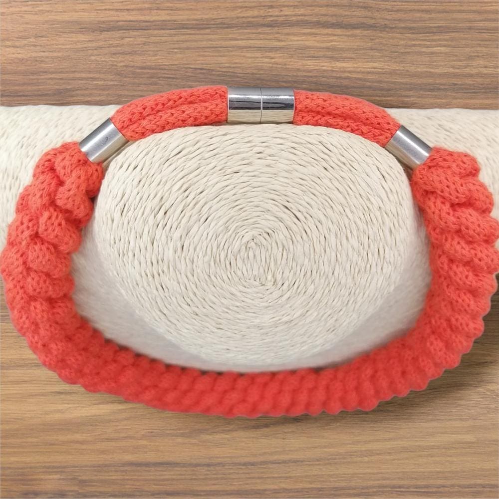 Chunky orange macrame necklace, photo highlighting magnetic clasp detail