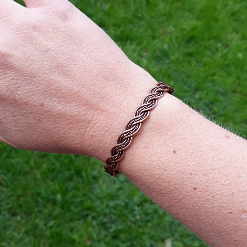 Copper cuff double twist bracelet on wrist