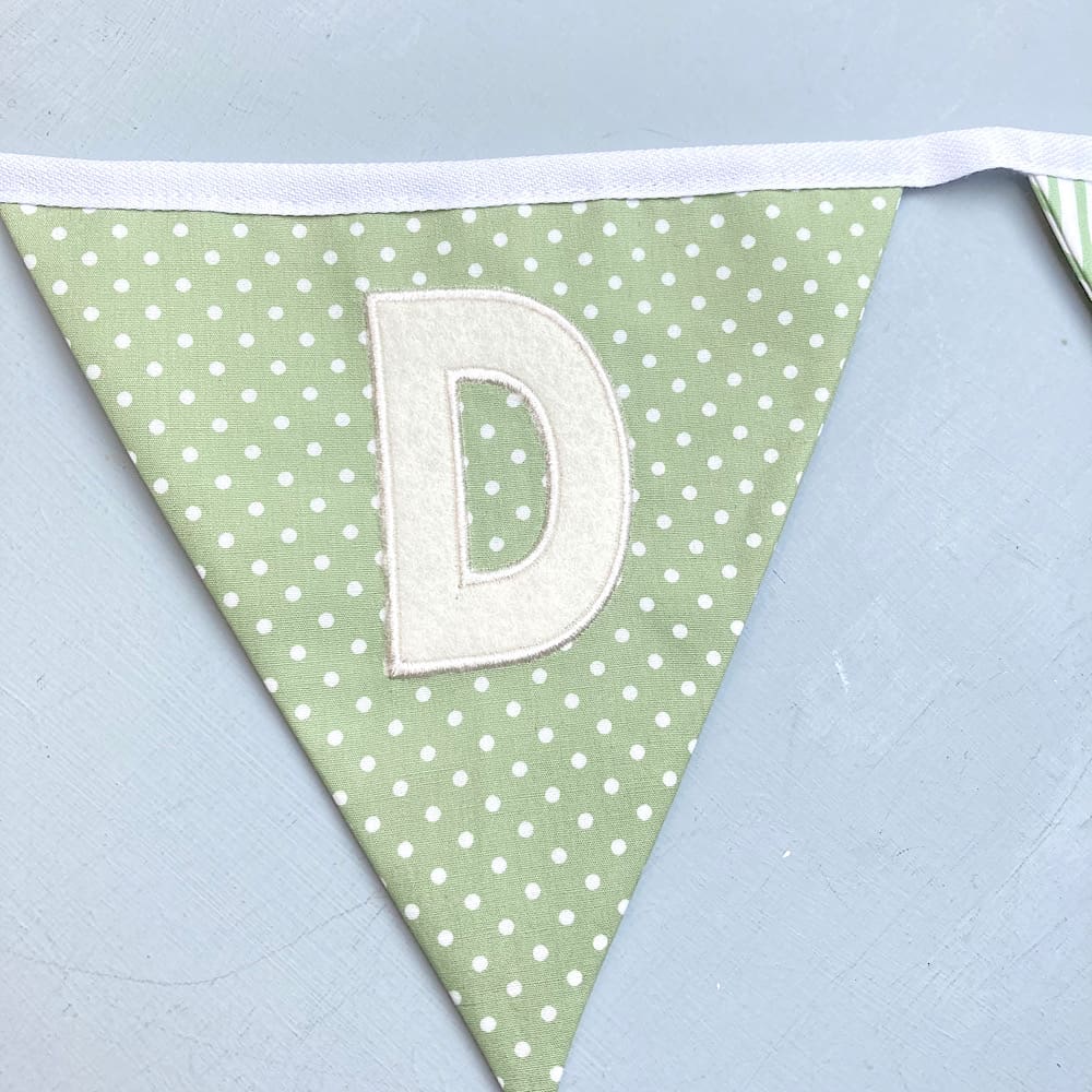 Green spotty embroidered flag