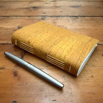 A6 Handmade Cork Journal filled with recycled plain white paper