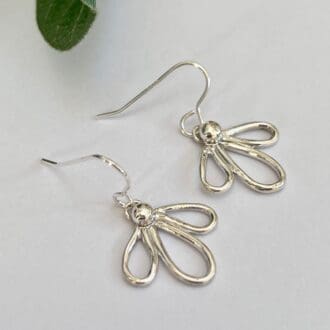 Silver three petal flower drop earrings