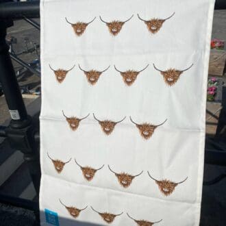 100% Cotton White Teatowel with repeated Highland Cow pattern