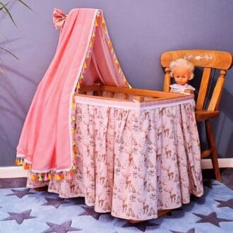 An upscale gift of a cradle for doll lovers or collectors