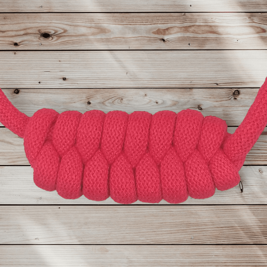 Chunky red statement necklace knot feature