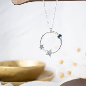 silver ring necklace with topaz and stars