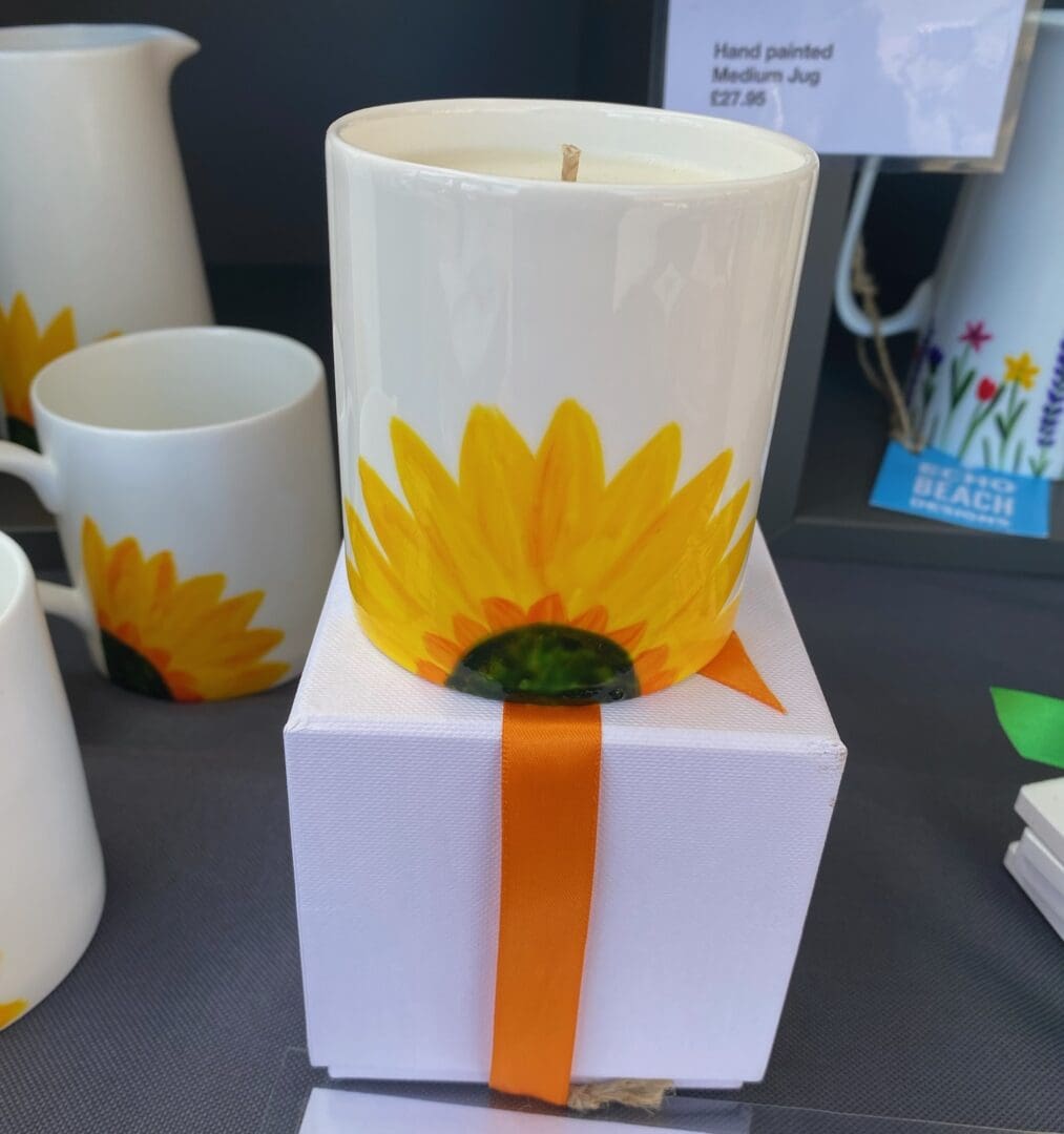 Hand poured candle in a hand painted ceramic holder - design of Sunflower