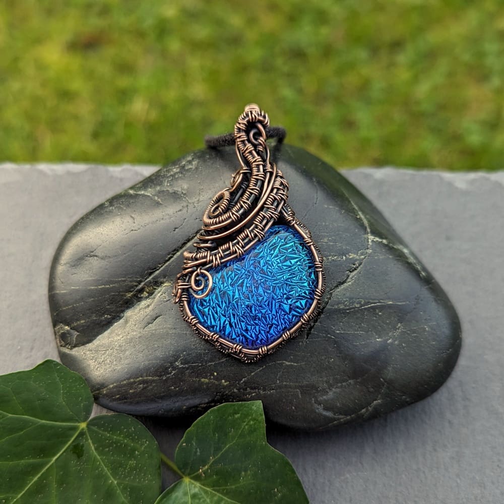 Handmade copper wire wrapped pendant with blue dichroic glass cabochon
