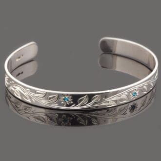 engraved flower and leaf birthstone silver cuff bracelet