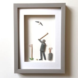 gift for a golfer pebble art man swinging his golf club at a passing seagull