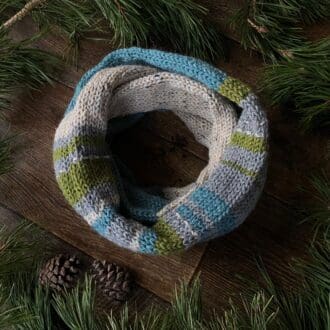 three panel hand knit infinity scarf, soft blue, stone nepp and stripe embroidered panels