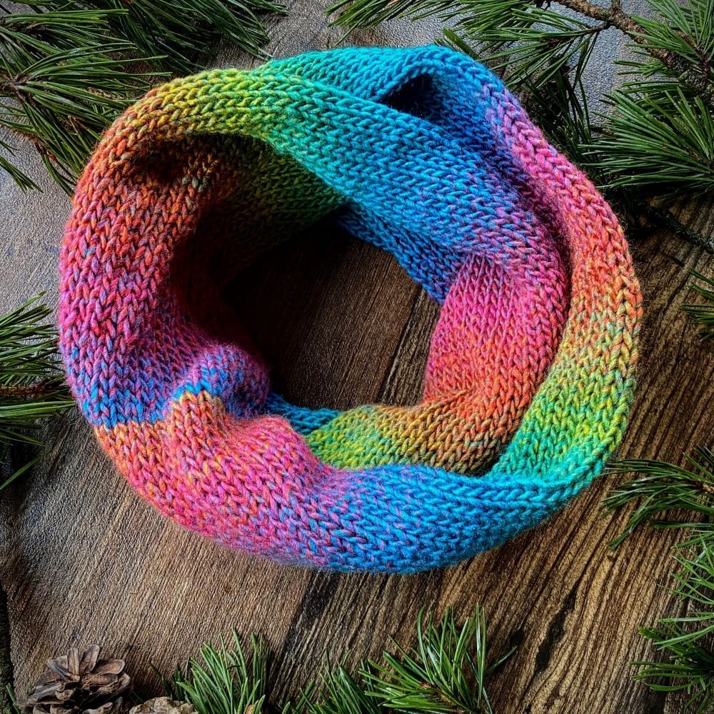 Rainbow hand knitted cosy infinity scarf