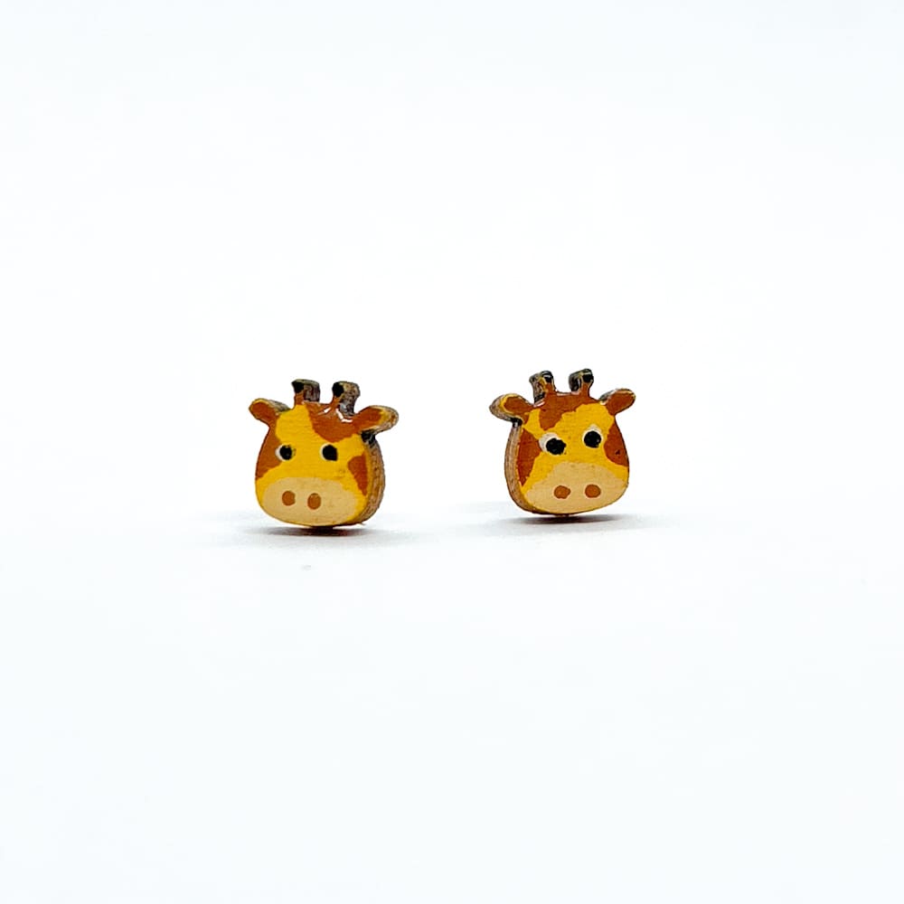 cute brown and yellow giraffe earrings on a white background