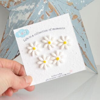 Five handmade polymer clay daisy fridge magnets for noticeboards