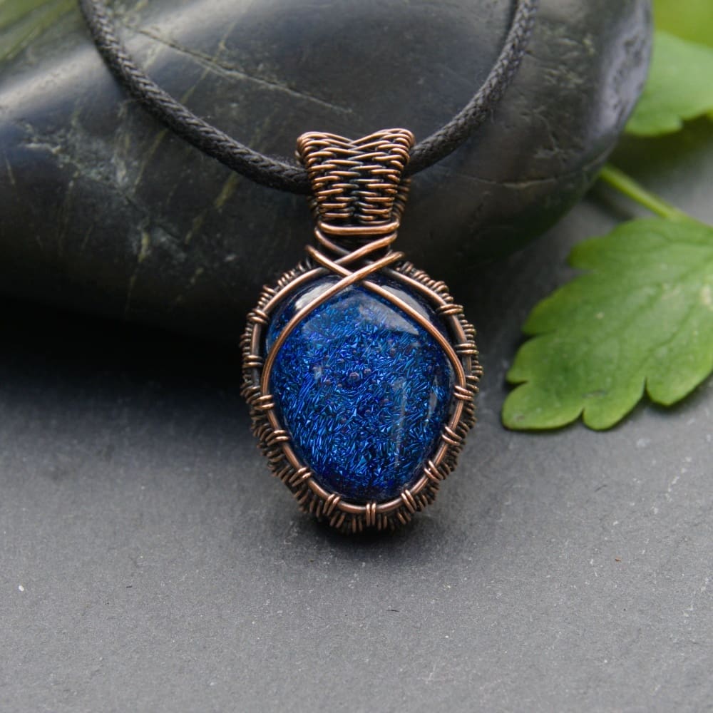 Handmade wire wrapped blue dichroic glass pendant