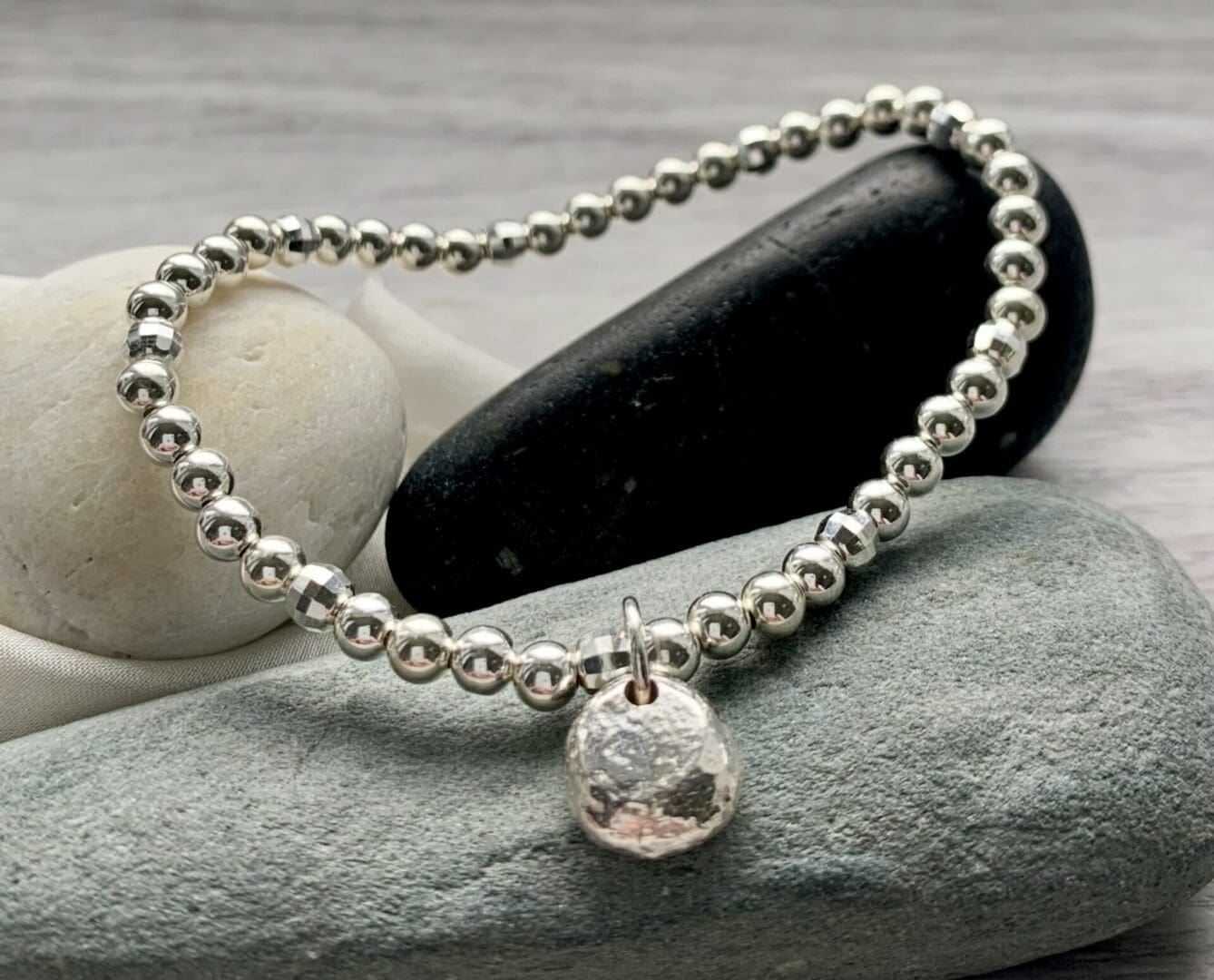 silver stretch bracelet unique recycled silver pebble charm