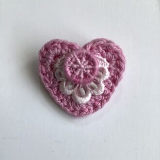 Crochet heart brooch