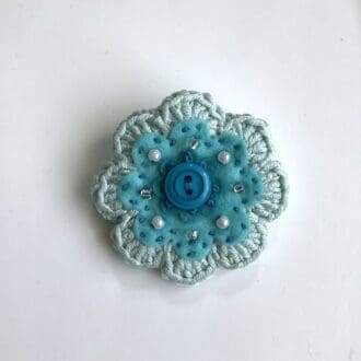 Crochet and felt flower brooch