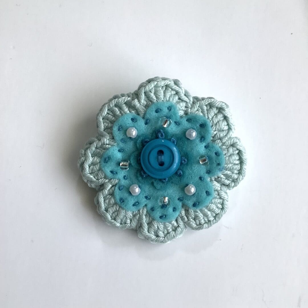 Crochet and felt flower brooch