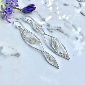 Long sterling silver asymmetrical filigree earrings
