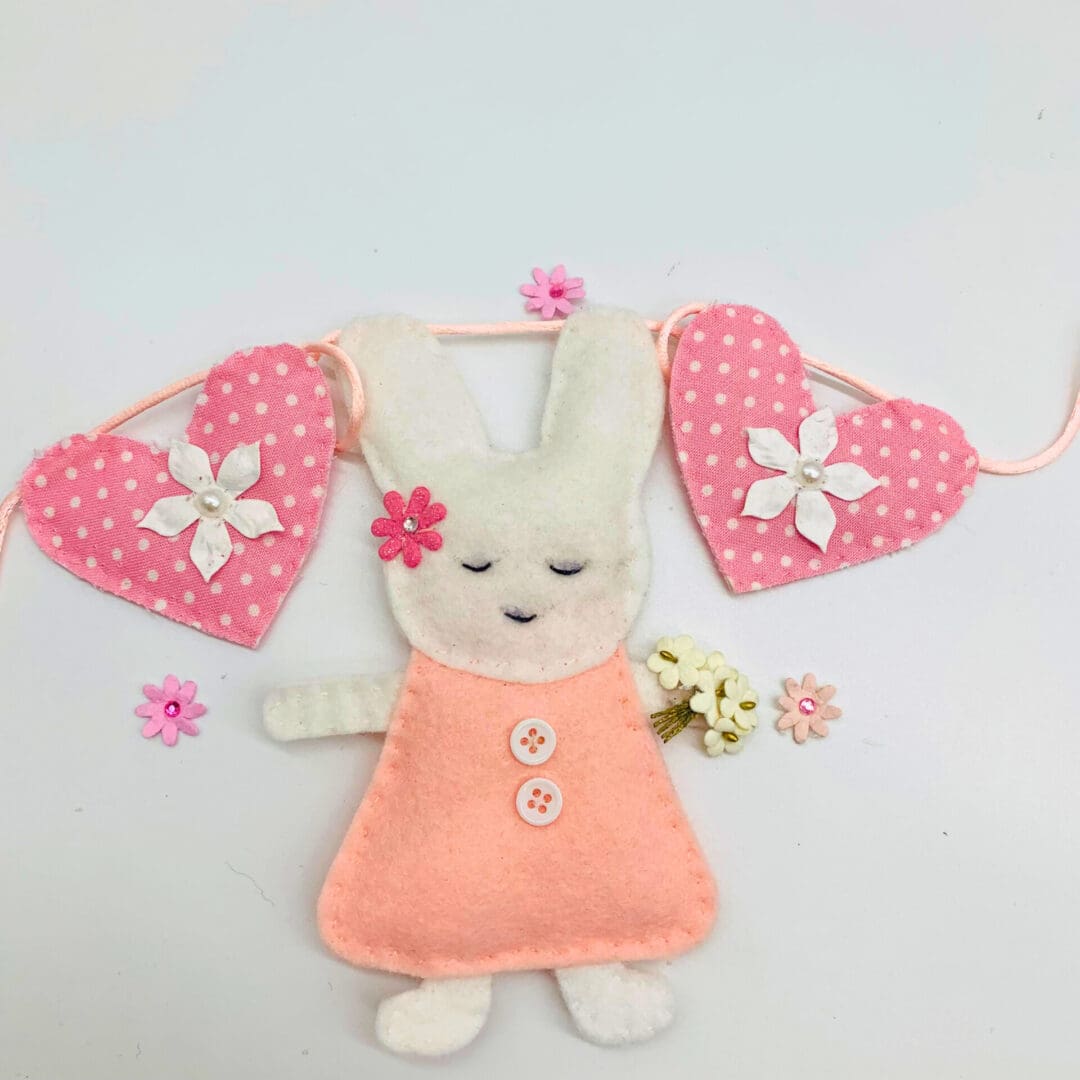 Bunny Rabbits holding flowers Bunting