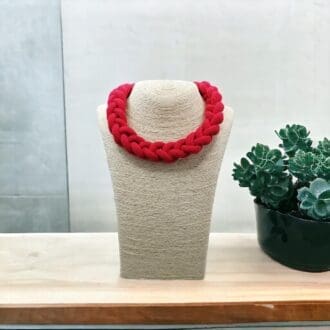 Chunky Red Knotted Cord Necklace displayed on a cream coloured bust display
