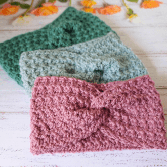 handmade crochet twisted acrylic earwarmer in various colours, available in sizes infant, Toddler, child and adult. Knitted headband make a good Mummy and Me gift