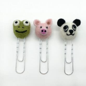 Handmade needle felted bookmarks, made from 100% wool and attached to a paperclip