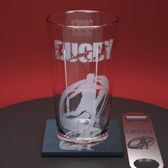 Rugby engraved pint glass together with matching engraved slate coaster and stainless steel bottle opener