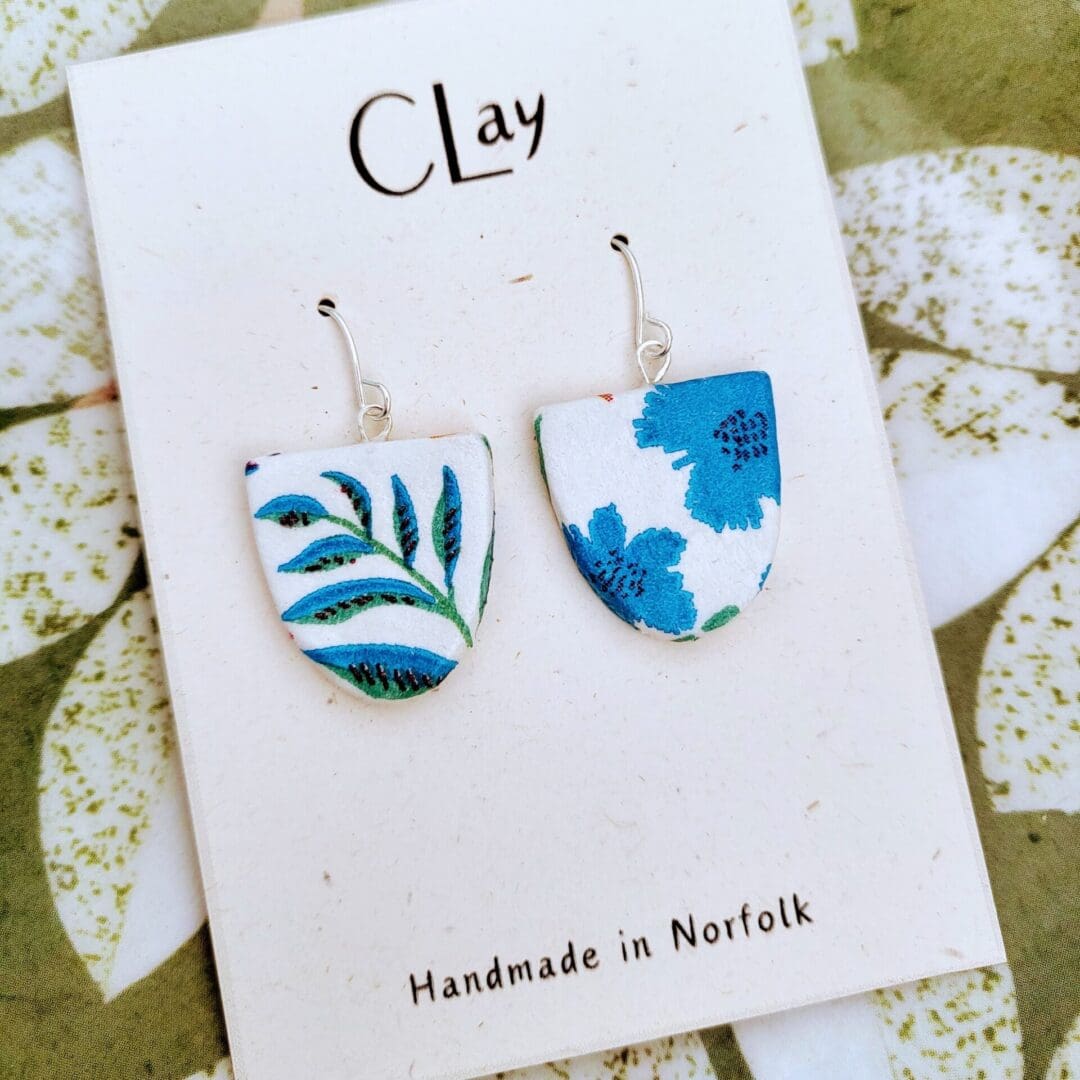 Lovely floral earrings made from clay with a distinctive decoupage pattern.
