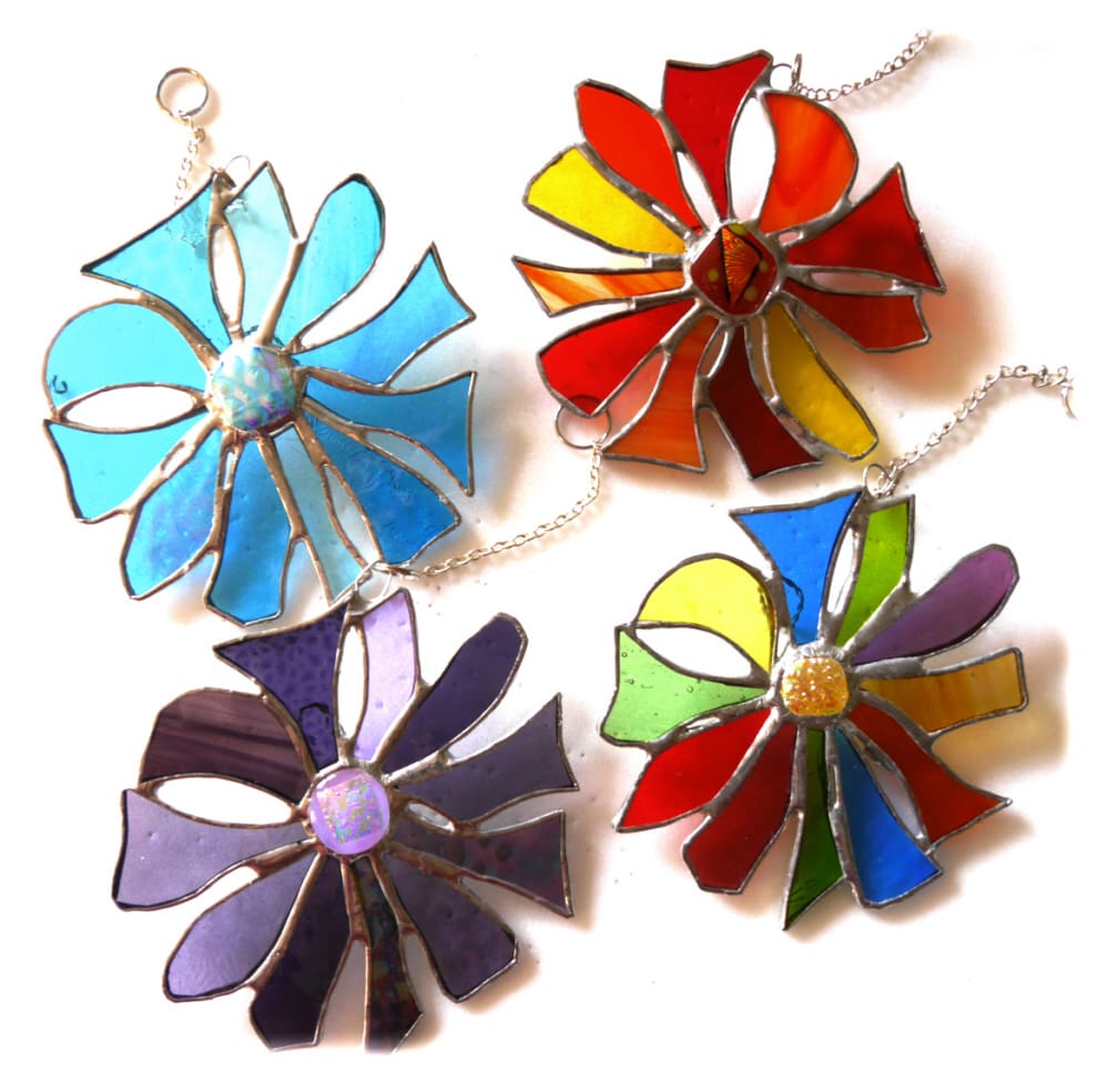 Abstract dichroic flower stained glass suncatcher tropical red purple sea colours turquoise