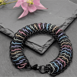 Chainmaille viperscale bracelet made with black and matt pastel colured rings