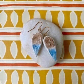 Unusual teardrop earrings made from clay. The blue / brown colour highlights the natural texture of the clay.