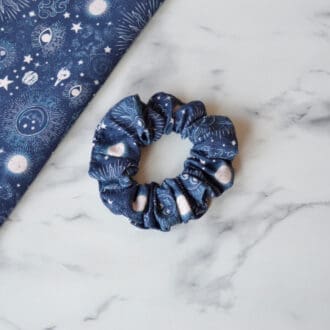 Navy blue scrunchies with cream sun, moon and stars