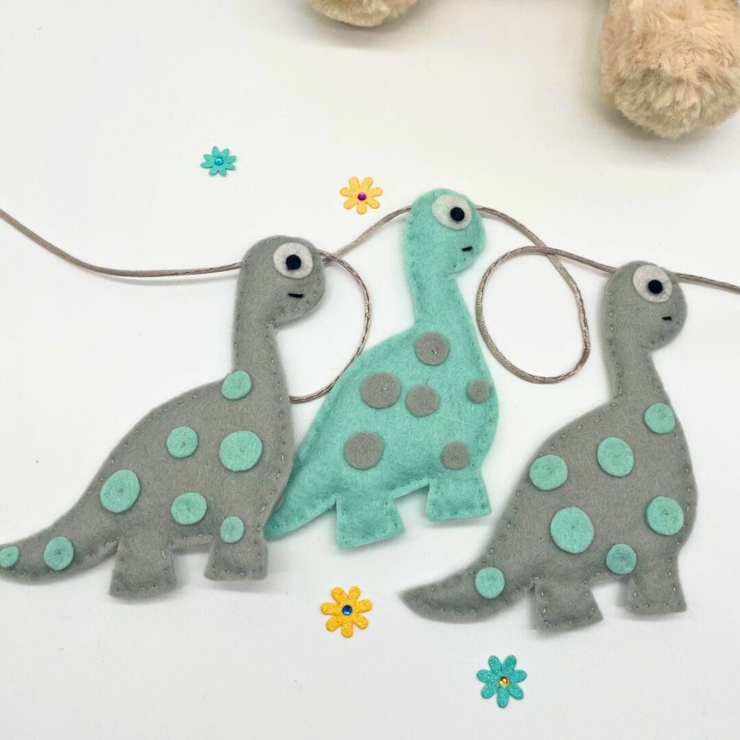 Grey and mint dinosaurs Bunting