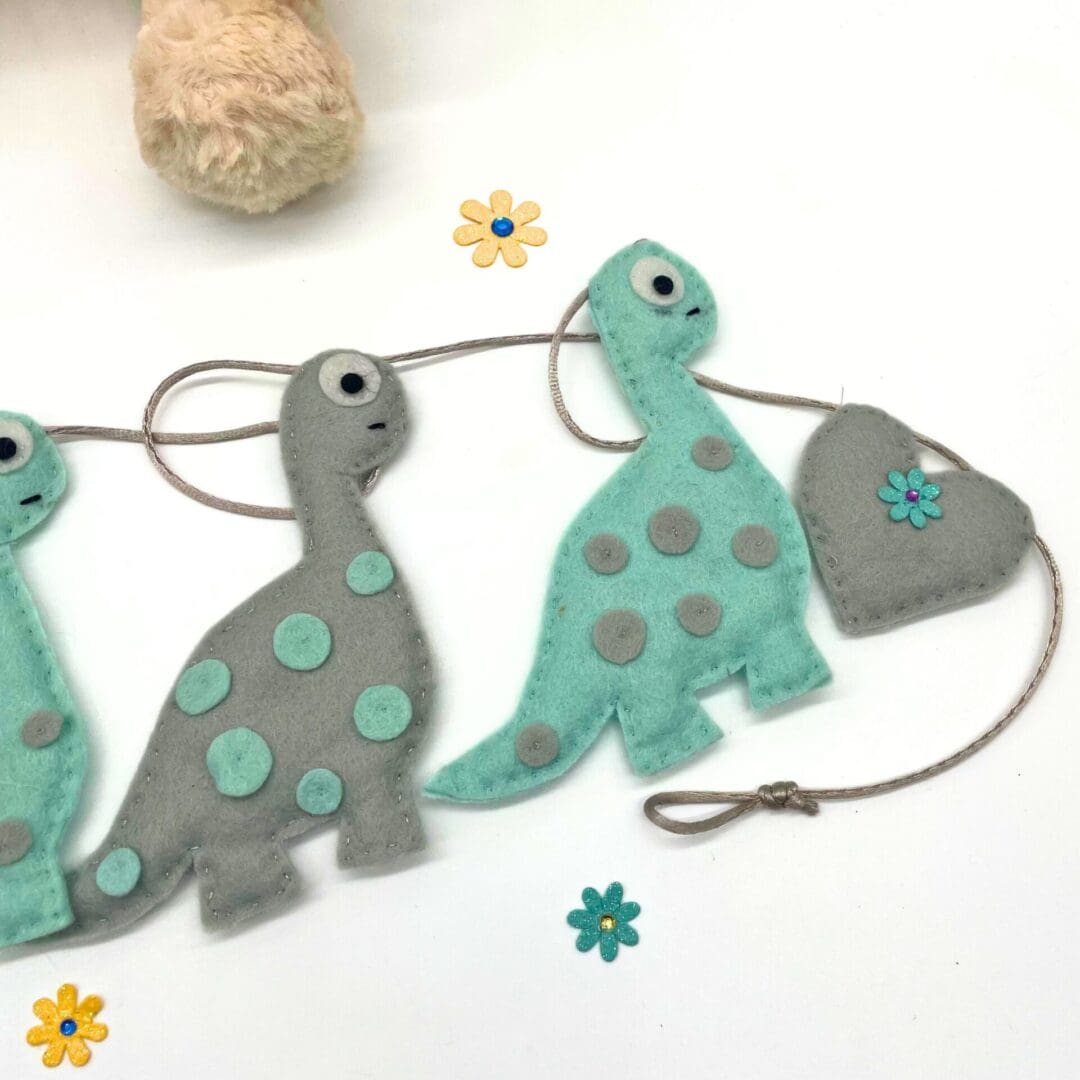 Grey and mint dinosaurs Bunting
