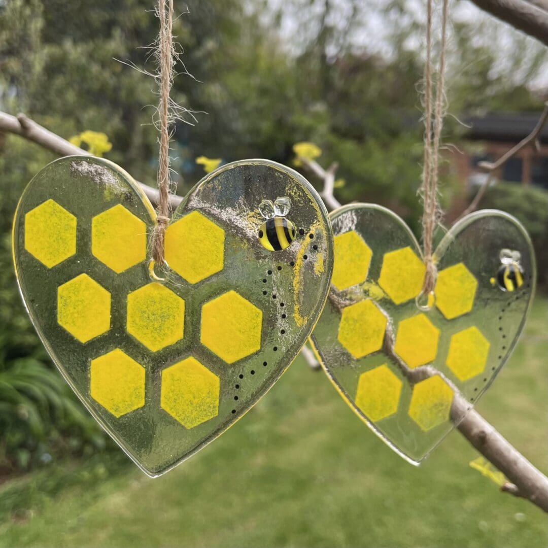yellow honeycombe pattern glass hearts with bees