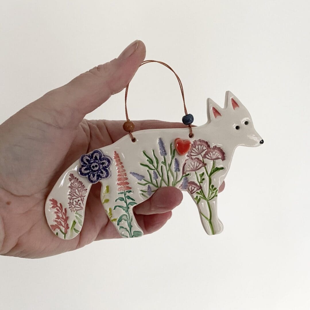 Pottery fox hanging decoration pink flowers