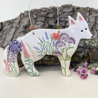 Fox with pink flowers