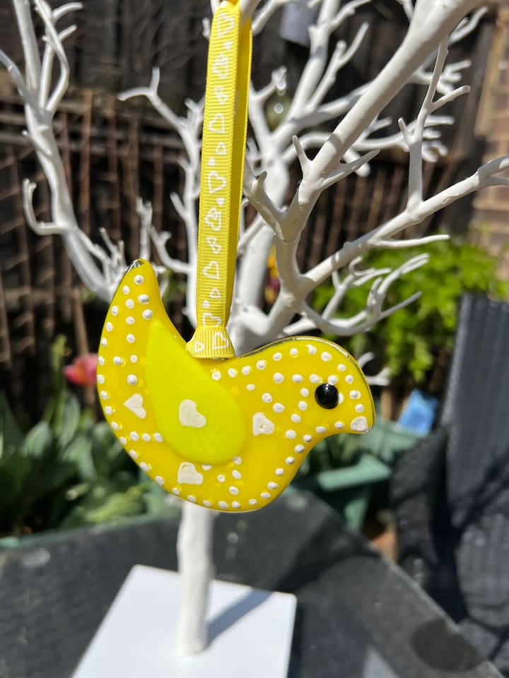 Yellow fused glass bird