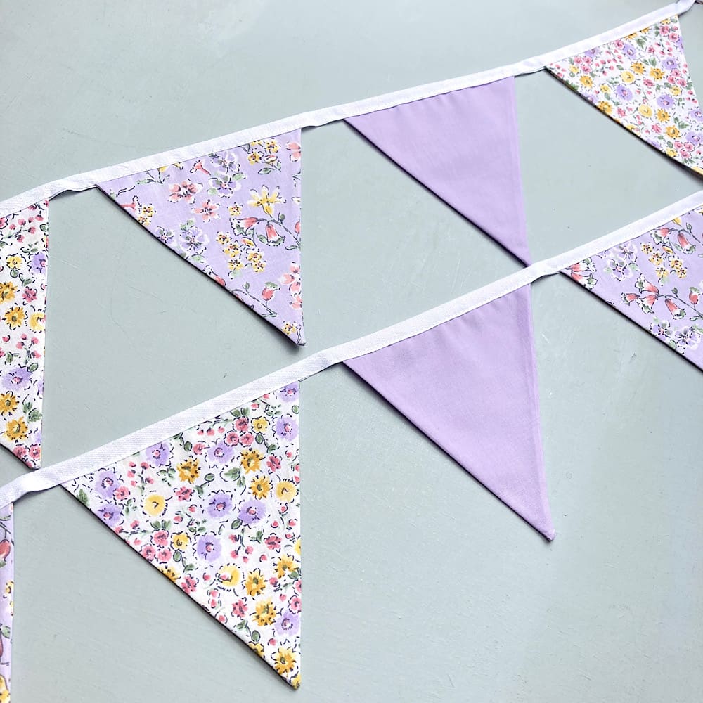 Lilac Floral bunting hung on wall